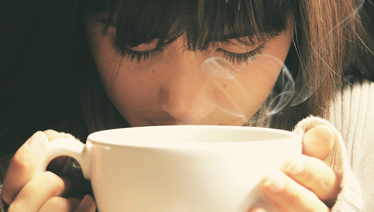 a girl drinking tea